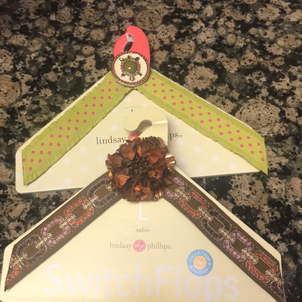 Two large Linda Phillips flip flop straps